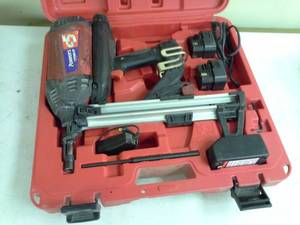 lot 542 image: Powers Fasteners Trak-It Tool C5, Batteries, Charger, Case