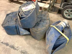 lot 585 image: Lot of (4) 4in. Fire Hoses