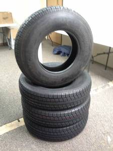 lot 304 image: Lot of (4) New Rubbermaster ST23585R16 Trailer Tire