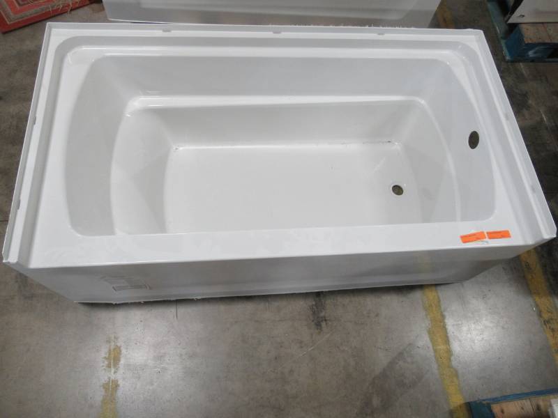lot 494 image: Sterling Deep Soaking Tub RH Drain Made of Vikrell in White 60 X 30 X 18 Tall. - Small Crack in Bottom LH Front Corner - See Photos.