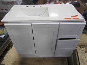 lot 148 image: Style Selections 36.5-in White Single Sink Bathroom Vanity with White Cultured Marble Top and mirror C50136M-SS