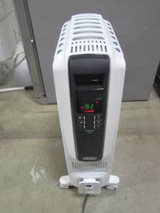 lot 149 image: DeLonghi 1500-Watt Oil-filled Radiant Tower Electric Space Heater TRD40615EL