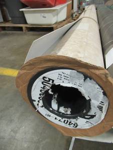 lot 305 image: 12 Foot Linoleum Roll (cut) Approximately 25-50 in Length.