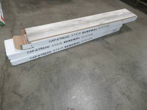 lot 340 image: Cap A Tread 017073856 Ocala OakChiffon Lace 47 in. Length x 12 in. Deep x 7-38 in. Height Vinyl Overlay Riser - 3 Cases, 9 Risers Total.