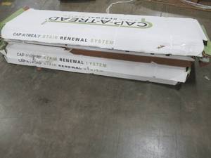 lot 345 image: Cap A Tread Brazil Cherry 47 in. Length x 12-18 in. Deep x 1-1116 in. Height Laminate to Cover Stairs 1 in. Thick, T2-1532-L - 4 Caps.