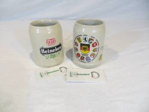 lot 125 image: 2 Ceramic Beer Steins & 2 Heineken Bottle Openers