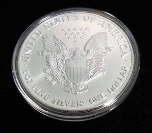 1990 AMERICAN SILVER EAGLE 1 TROY OZ. .999 FINE SILVER IN AIRTITE