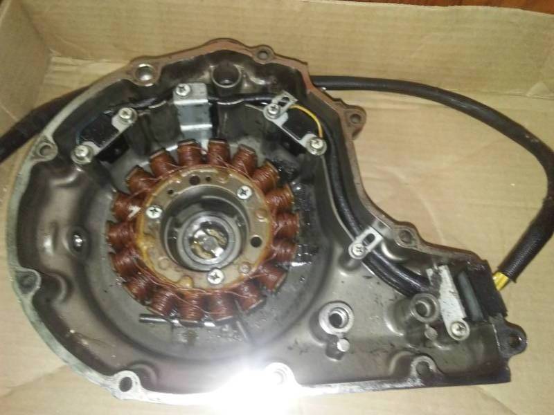 lot 27 image: BIG LOT Misc. motorcycle Parts. Electric Stator motorcycle 2 mirrors AND MORE.