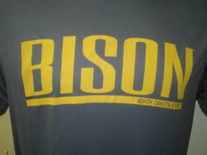 lot 4 image: NDSU BISON T -SHIRT, MENS MEDIUM, wick away fabric.