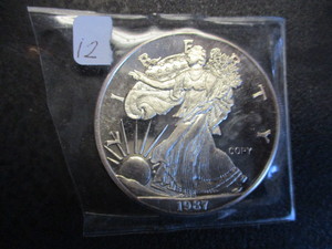 lot 12 image: 1987 2oz American Eagle Silver Round