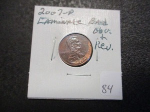 lot 84 image: Rare Error Coin - 2007-P Lincoln Cent. Bad Laminate on Obverse and Reverse