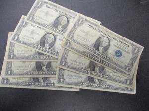 lot 96 image: 9 Silver Certificates 1957-B and 1935-G