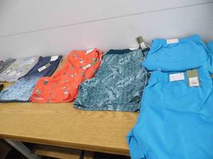 lot 21 image: Mens Swimsuits - Ladies Capris - Girls Party Dress