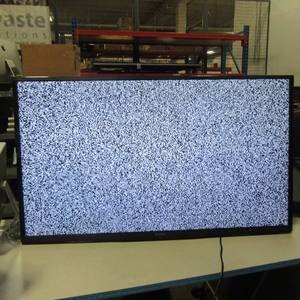 lot 14 image: 62 in SHARP LCD TV   Tested Working