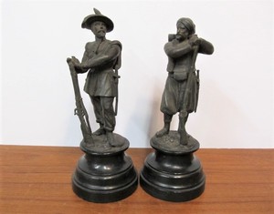 lot 33 image: Pair of Antique Cast Metal HunterSoldier Statues