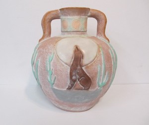 lot 42 image: Large Round Handled Southwestern Pottery Just wFigures & Howling Wolf Motif