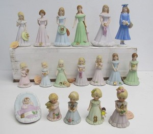 lot 96 image: Collection of ENESCO Growing Up Porcelain Figurines