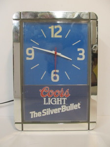 lot 116 image: COORS LIGHT Silver Bullet Lighted Advertising Clock