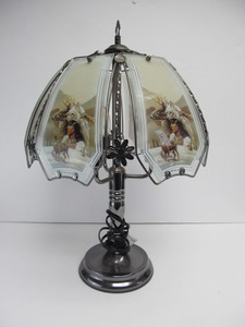 lot 67 image: Working Paneled Glass Native American Motif Table Lamp