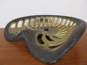 lot 181 image: Antique CHAMPION Cast Iron Tractor Seat #1
