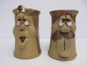 lot 225 image: Pair of Vintage Stoneware Face Mugs