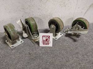 lot 31 image: (4) Hamilton Caster Wheels Cast Iron Hub w Rubber Wheels