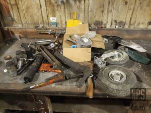 lot 58 image: Lot of Parts, Pneumatic Tires, Oil Cans, Pipe Wrench and More