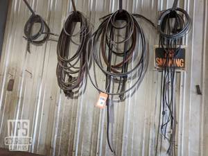 lot 32 image: Lot of Hoses and Wire on Wall