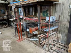 lot 85 image: Contents of Metal Rack - Posts, Metal Stock and More
