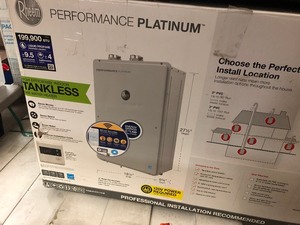 lot 201 image: Rheem Performance Platinum 9.5 GPM Liquid Propane High Efficiency Indoor Smart Tankless Water Heater in good conditions