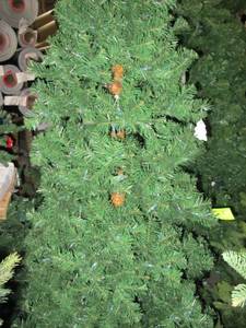 Artificial LED Tree in green, roughly 8 feet tall by Vickerman