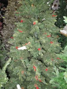 Artificial LED Tree in green with red berries, roughly 8 feet tall by Vickerman
