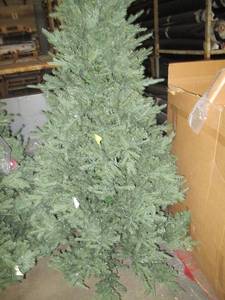 Artificial LED Tree in green, roughly 8 feet tall by Vickerman