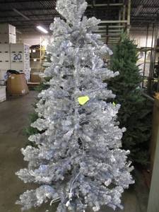 Artificial LED Tree in silver tinsel, roughly 9 feet tall by Vickerman
