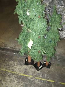 Artificial Slim Profile 3 LED Tree Set in green, roughly 456 feet tall by Vickerman