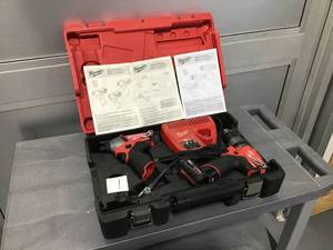 lot 1 image: MILWAUKEE Fuel M12 Impact and Drill Set includes a 4Ah battery and charger