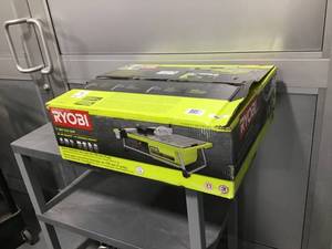 lot 3 image: RYOBI 7 inch 4.8 Amp Tabletop Tile Saw