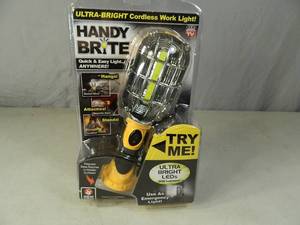 lot 33 image: New Handy Brite Cordless Work Light