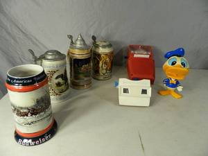 lot 81 image: Vintage Toys and Steins