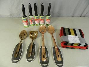 lot 163 image: New Lint Rollers, New Utensils, and New Kitchen Towels