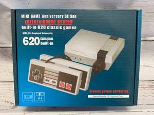 lot 68 image: Mini Entertainment Game System with 620 Games