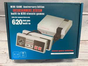 lot 114 image: Mini Entertainment Game System with 620 Games