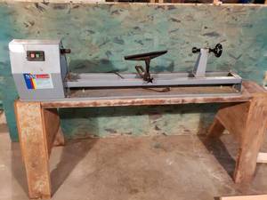 lot 2 image: Homier Distributing Wood Lathe