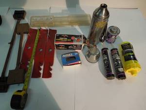 lot 29 image: NIP Mower Blades, Antique Thermos, Rolling Movers, Roof Cement, Etc.
