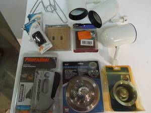 lot 30 image: Plumbing, Lighting, Garage Door Remotes, Stapler, Etc