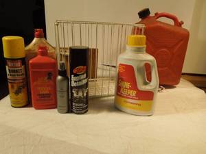 lot 84 image: Gas Can, Waste Cabinet Drawer, Floor Polish, Charcoal Lighter Fluid, Etc
