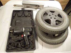 lot 86 image: Impact Wrench, Tires, Door Closer