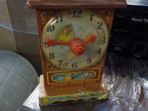 lot 10 image: Fisher Price Vintage Musical Tick T...