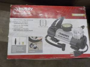 lot 122 image: Husky 120 volt Inflator...