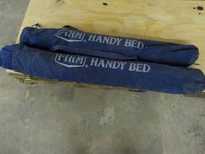 lot 131 image: 2 Firm Handy Beds...